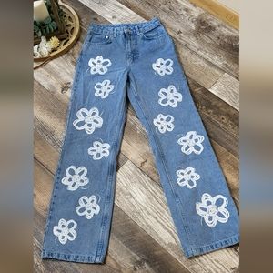 The RAGGED Priest jeans size 24 with flowers painted